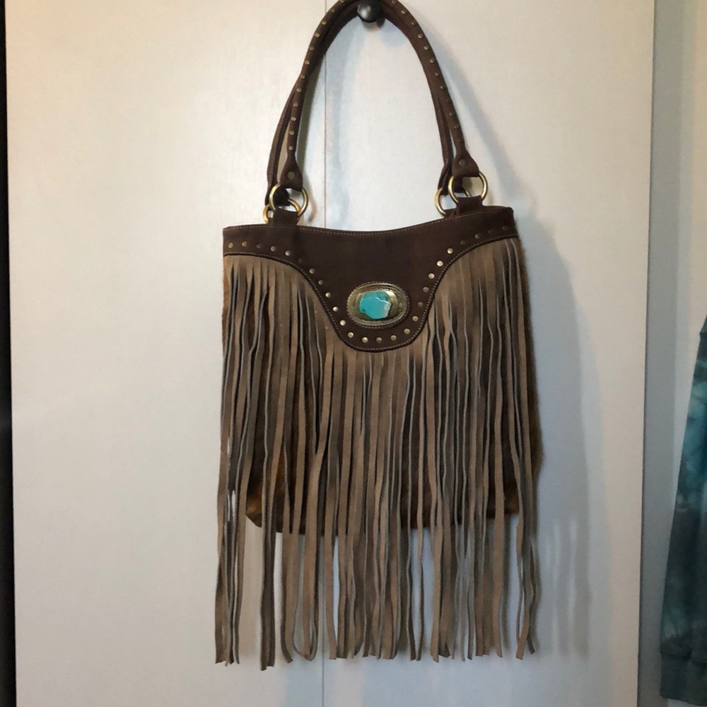 Fringe and leather purse